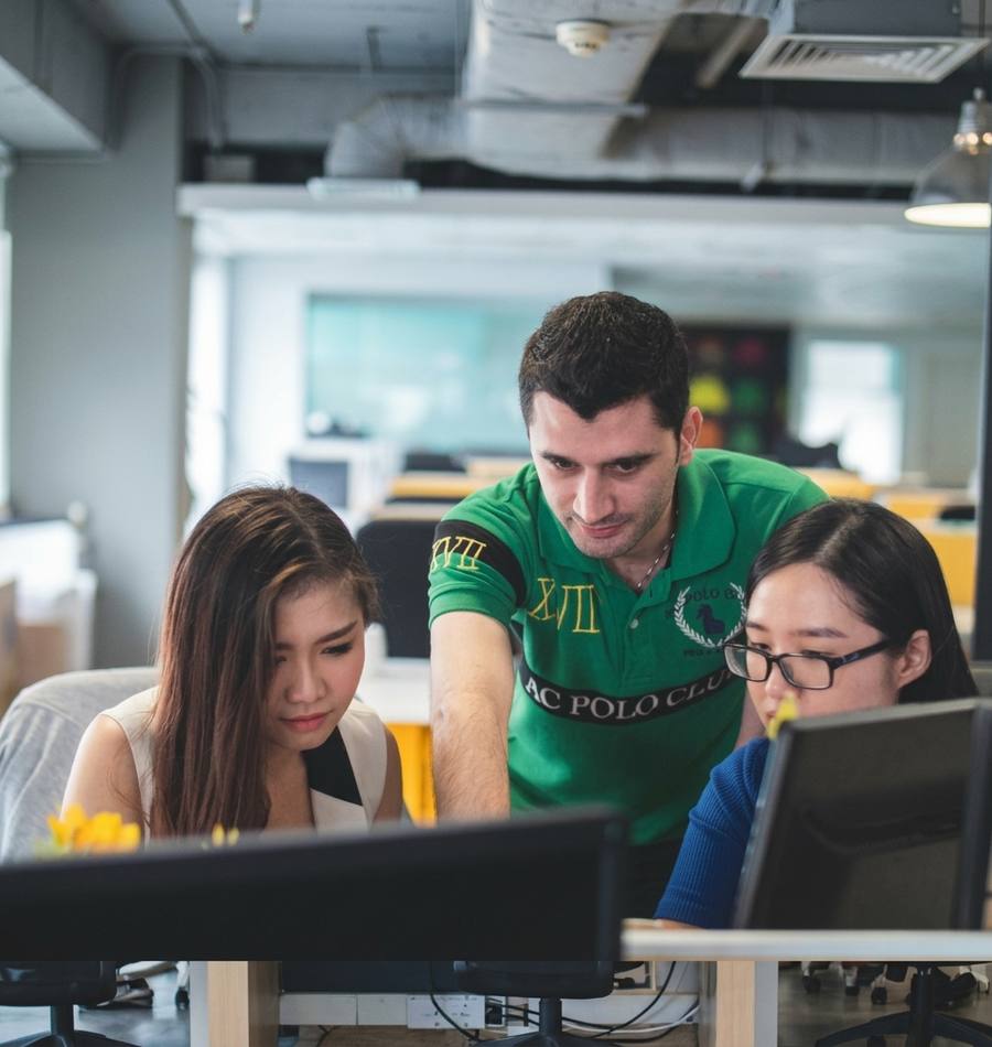 A mixed team of engineers working together